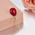Confession balloon brooch